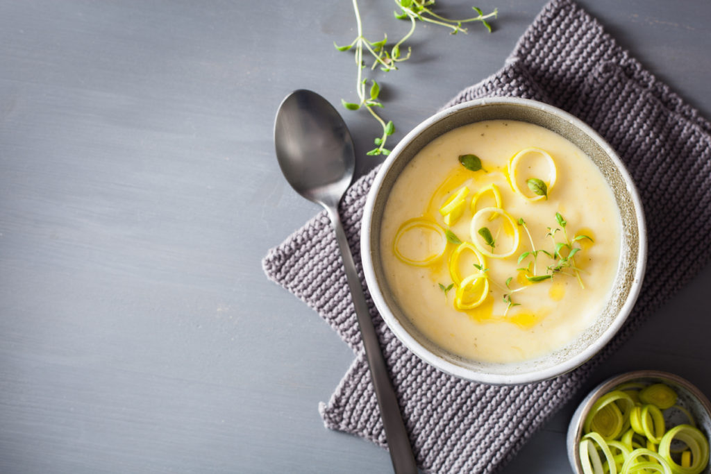 Camembert wine soup in pot